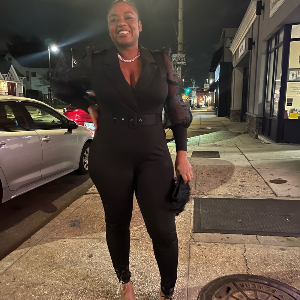 Sleek Black Jumpsuit with V-Neck and Belted Waist